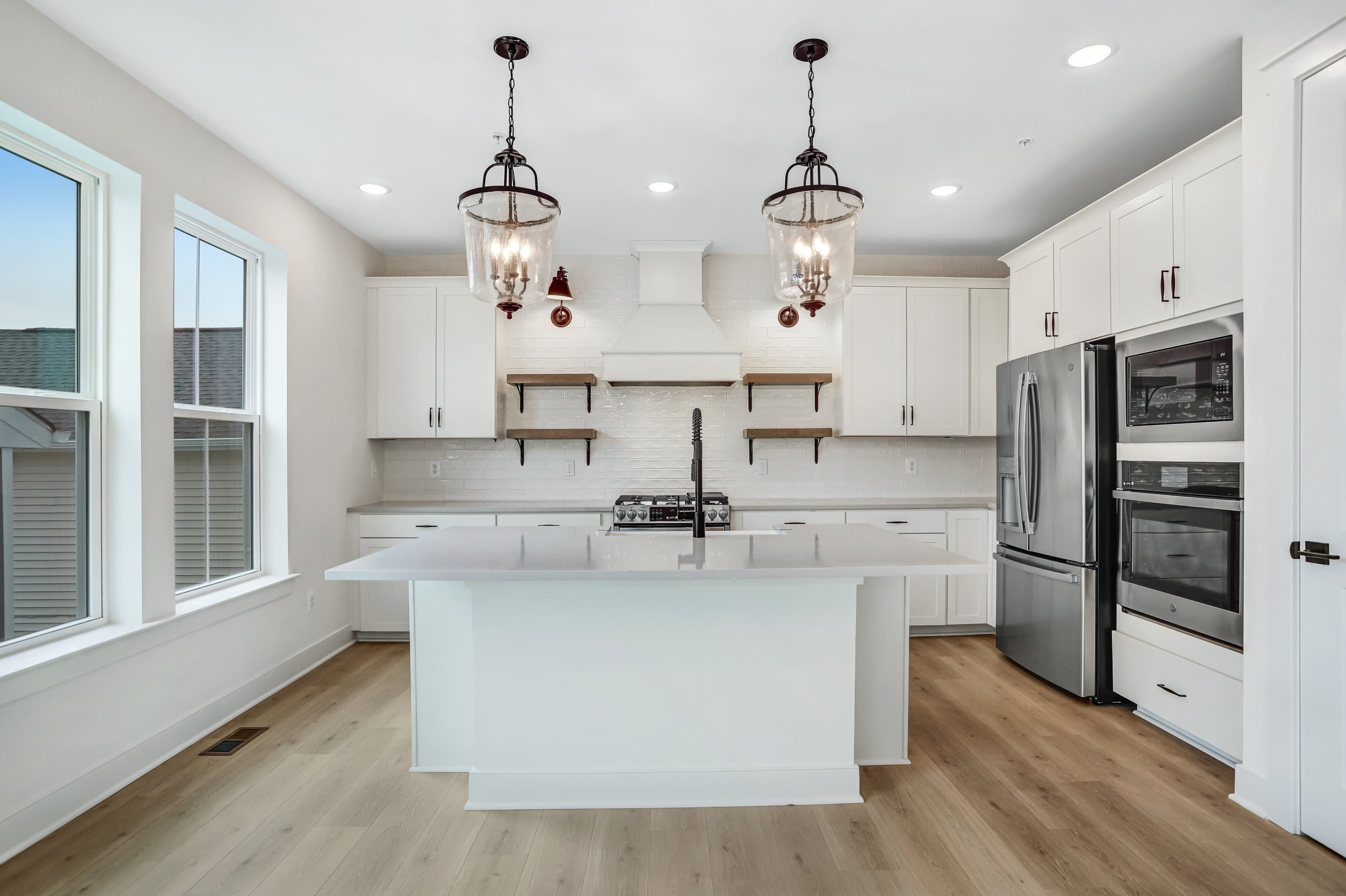 Kitchen with stylish floating shelves